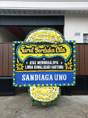 Papan Bunga Duka di Purba